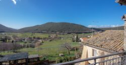 PORZIONE DI CASA IN PIETRA CON INGRESSO INDIPENDENTE E TERRAZZINO PANORAMICO.