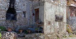 PORZIONE DI CASA IN PIETRA CON INGRESSO INDIPENDENTE E TERRAZZINO PANORAMICO.